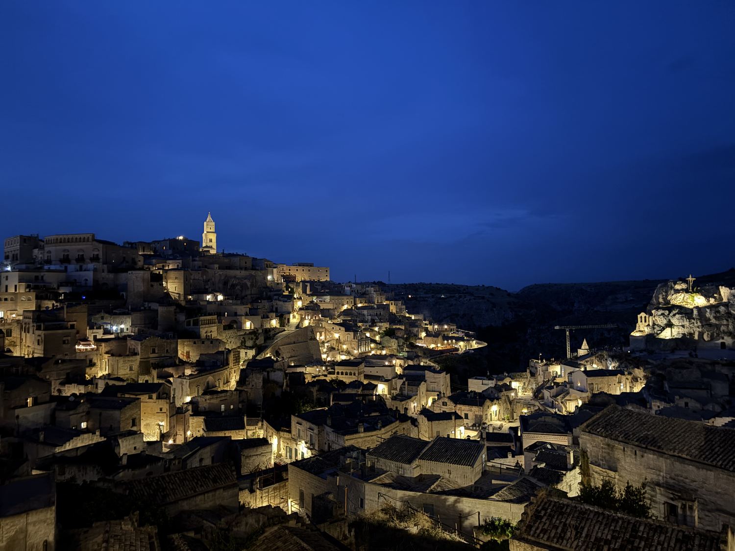 Matera at blue hour, the Sassi lit from inside